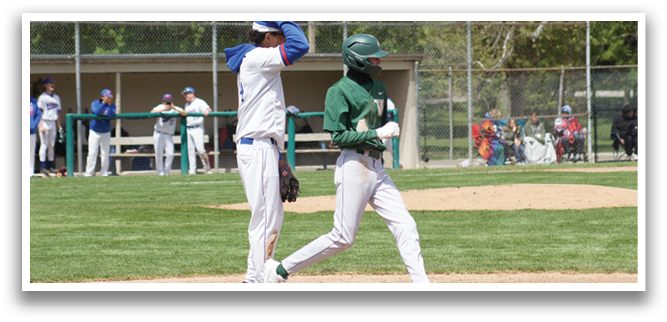 A baseball player in a green shirt and white pants is running to first base. Description generated by AI