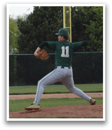 A baseball player in a green and white uniform is pitching a ball. Description generated by AI