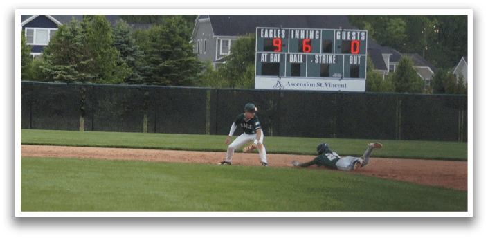 A baseball player slides into home base. Description generated by AI