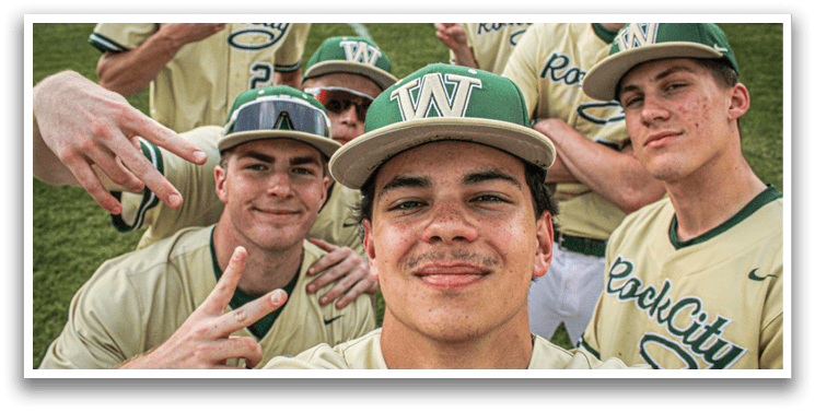 A group of baseball players posing for a picture. Description generated by AI