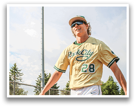 A baseball player wearing a yellow shirt and white pants. Description generated by AI