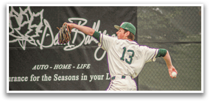 A baseball player wearing a white uniform and green hat catching a ball. Description generated by AI