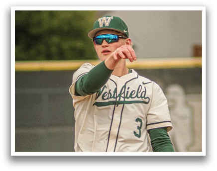 A baseball player wearing a Westfield jersey. Description generated by AI