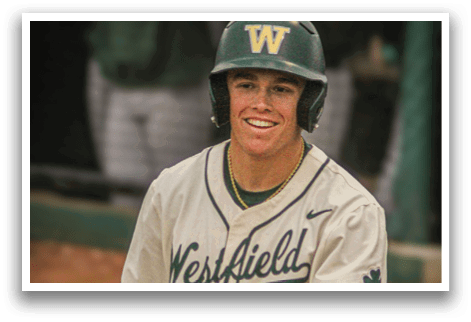 A baseball player wearing a green and white uniform with the number 6 on the back. Description generated by AI