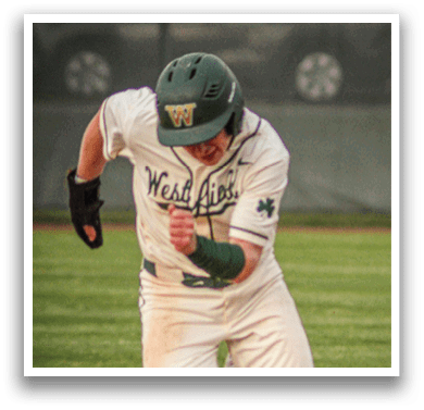 A baseball player running on the field. Description generated by AI
