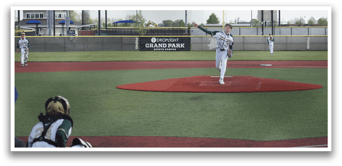 A baseball player is pitching a ball. Description generated by AI