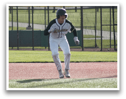 A baseball player running on a field. Description generated by AI