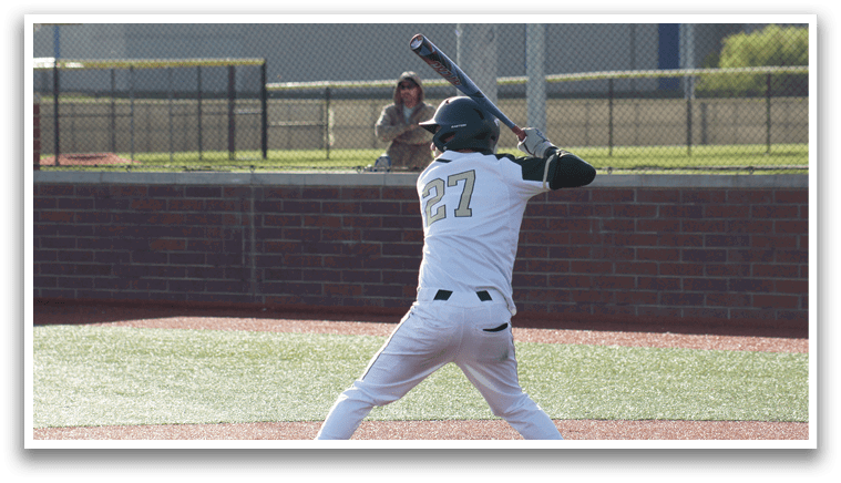A baseball player is swinging a bat. Description generated by AI
