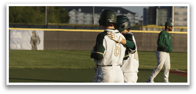 Two baseball players hugging each other. Description generated by AI