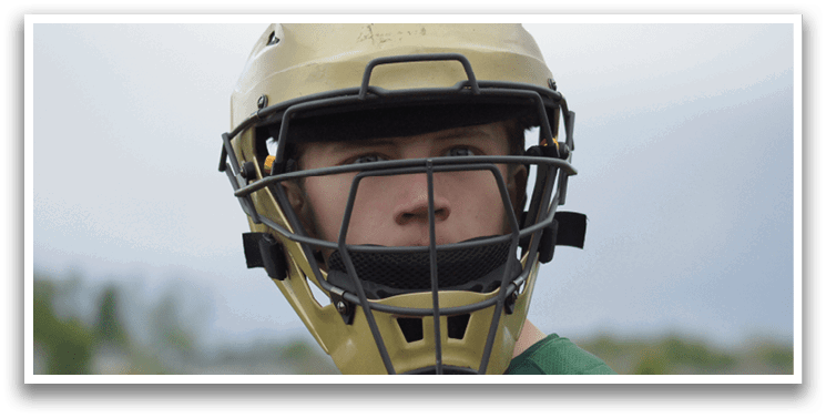 A baseball player wearing a helmet. Description generated by AI