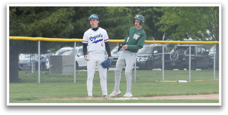 A baseball player wearing a helmet. Description generated by AI