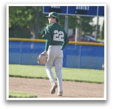 A baseball player sliding into a base. Description generated by AI