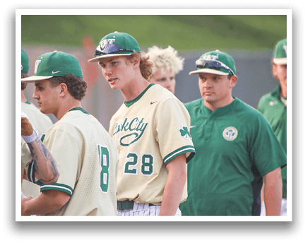 A baseball player in a yellow and green uniform is swinging a bat. Description generated by AI