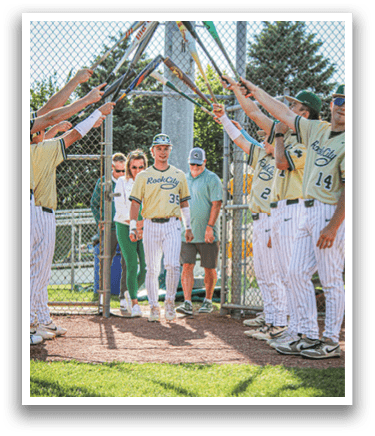 A baseball player is standing on the field. Description generated by AI