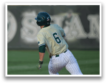 A baseball player in a yellow and green uniform is swinging a bat. Description generated by AI