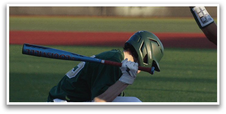 A baseball player in a white uniform is throwing a ball. Description generated by AI