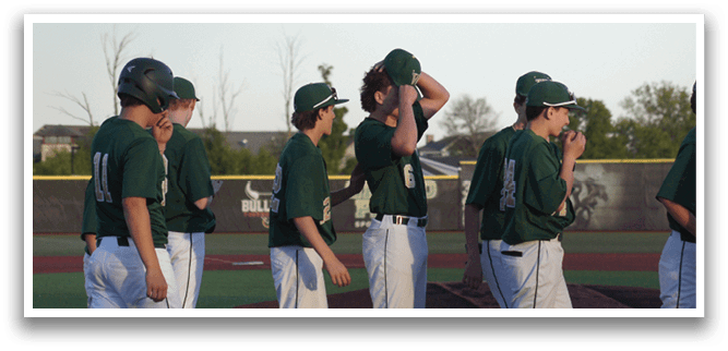 Two baseball players hugging each other. Description generated by AI