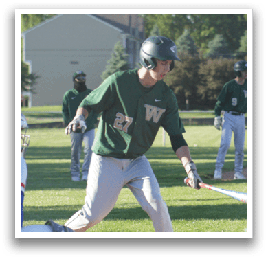 A baseball player sliding into a base. Description generated by AI