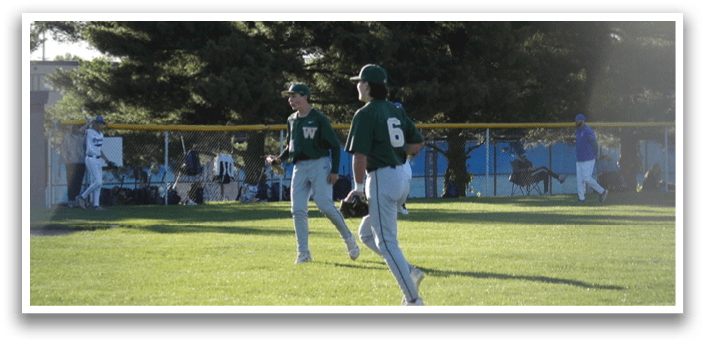 A baseball player slides into home base. Description generated by AI