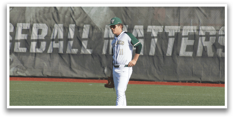A baseball player wearing a helmet. Description generated by AI