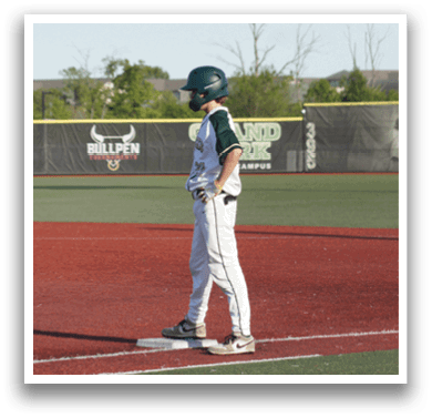 A baseball player sliding into a base. Description generated by AI