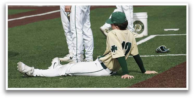 A baseball player wearing a helmet. Description generated by AI