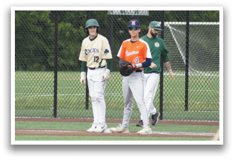 A baseball player in a green shirt and white pants is pitching a ball. Description generated by AI