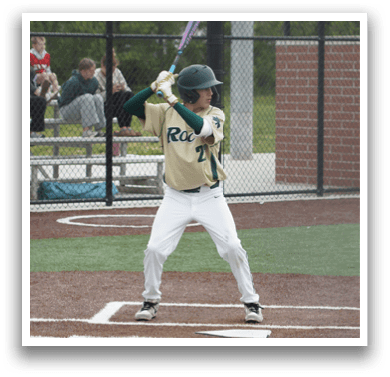 A baseball player sliding into a base. Description generated by AI