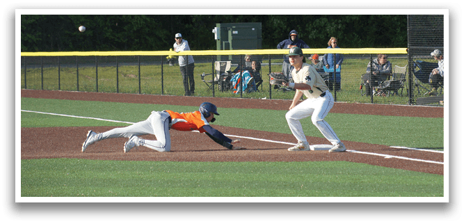 A baseball player wearing a green shirt and white pants is throwing a ball. Description generated by AI