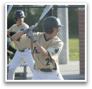 A baseball player sliding into a base. Description generated by AI