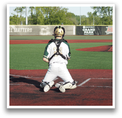 A baseball player sliding into a base. Description generated by AI