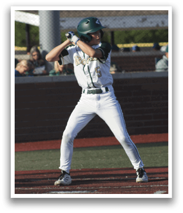 A baseball player in a green shirt and white pants is throwing a ball. Description generated by AI