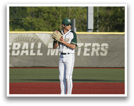 A baseball player in a green and white uniform is holding a bat and getting ready to swing. Description generated by AI