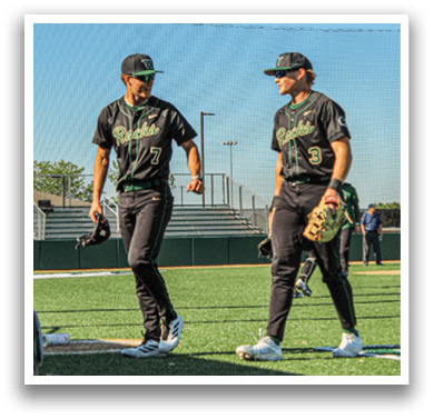 A baseball player wearing a green helmet and white uniform. Description generated by AI