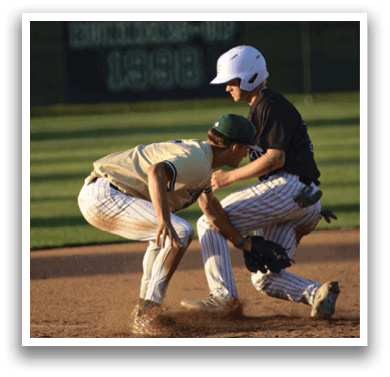 A baseball player in a green and gold uniform is throwing a ball. Description generated by AI