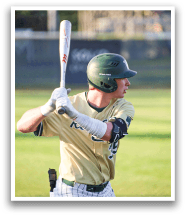 A baseball player is standing on the field. Description generated by AI