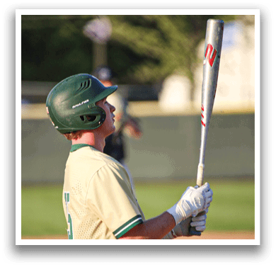 A baseball player wearing a green and white uniform. Description generated by AI