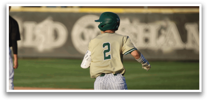 Three baseball players wearing white and green uniforms. Description generated by AI