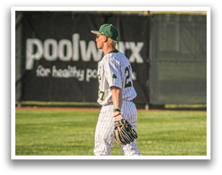 A baseball player wearing a green hat and a white uniform. Description generated by AI