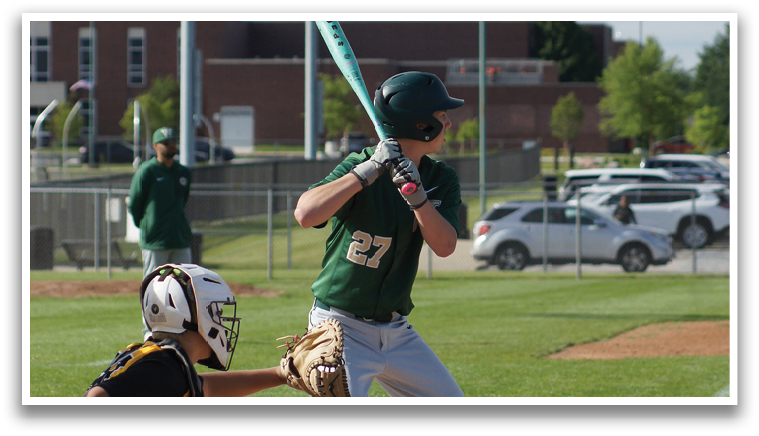 A baseball player is swinging a bat at a ball. Description generated by AI