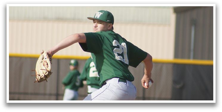 A baseball player wearing a green shirt and white pants is throwing a ball. Description generated by AI