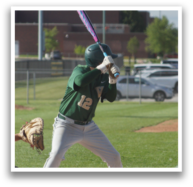 A baseball player is swinging a bat. Description generated by AI