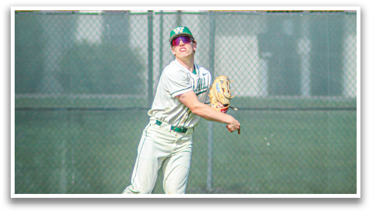 A baseball player in a white uniform is throwing a ball. Description generated by AI