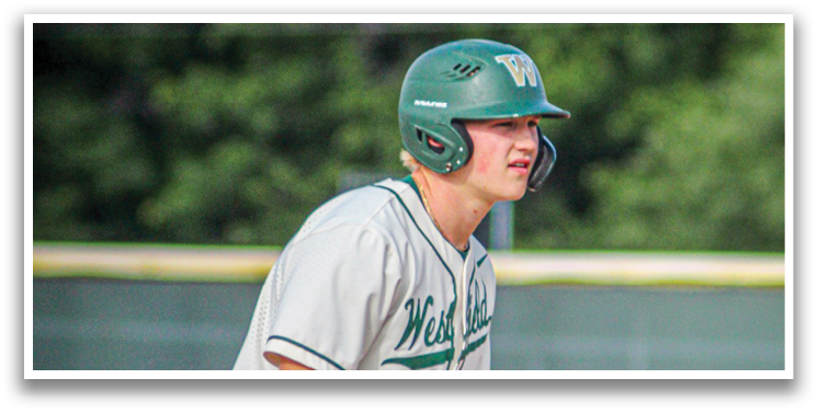 A baseball player wearing a green and white uniform. Description generated by AI