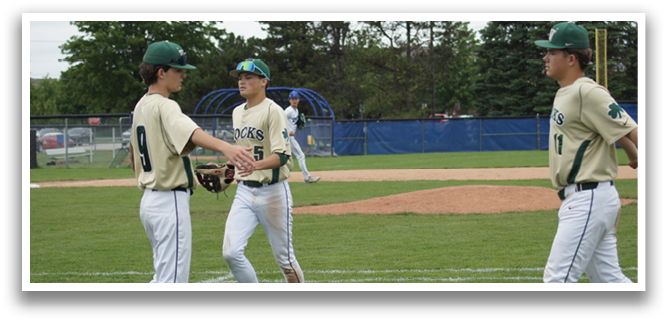 A baseball player wearing a green and white uniform is running towards a base. Description generated by AI