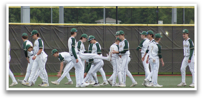 Baseball players wearing green and white uniforms. Description generated by AI