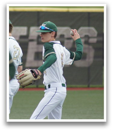 A baseball player wearing a green and white uniform. Description generated by AI