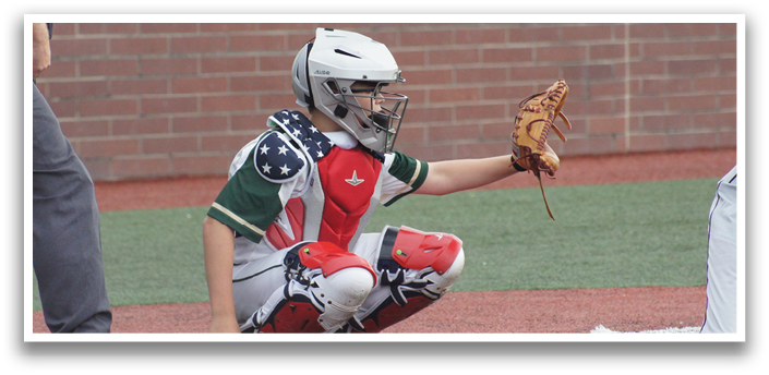 A boy wearing a baseball uniform and a catcher's mitt. Description generated by AI