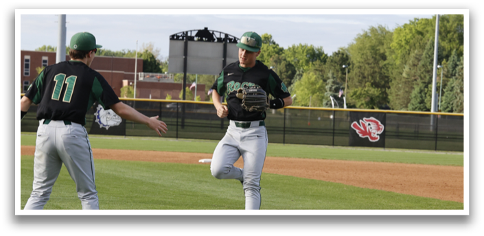 Two baseball players on a field. Description generated by AI