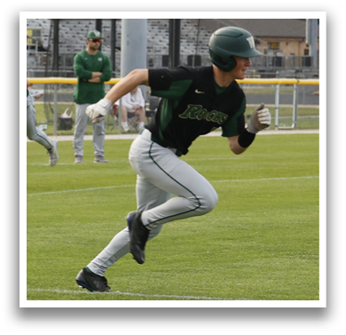 A baseball player running on the field. Description generated by AI